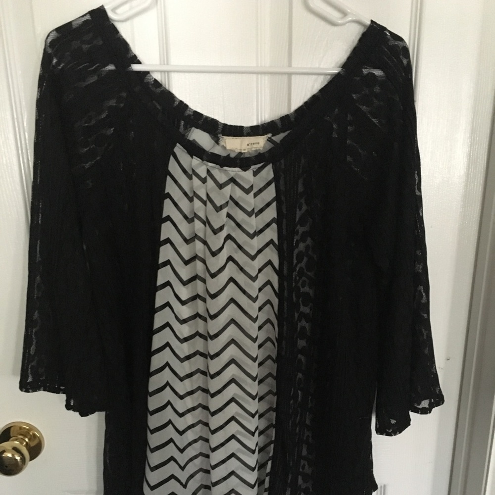 Boutique brand A’reve chevron print and lace top